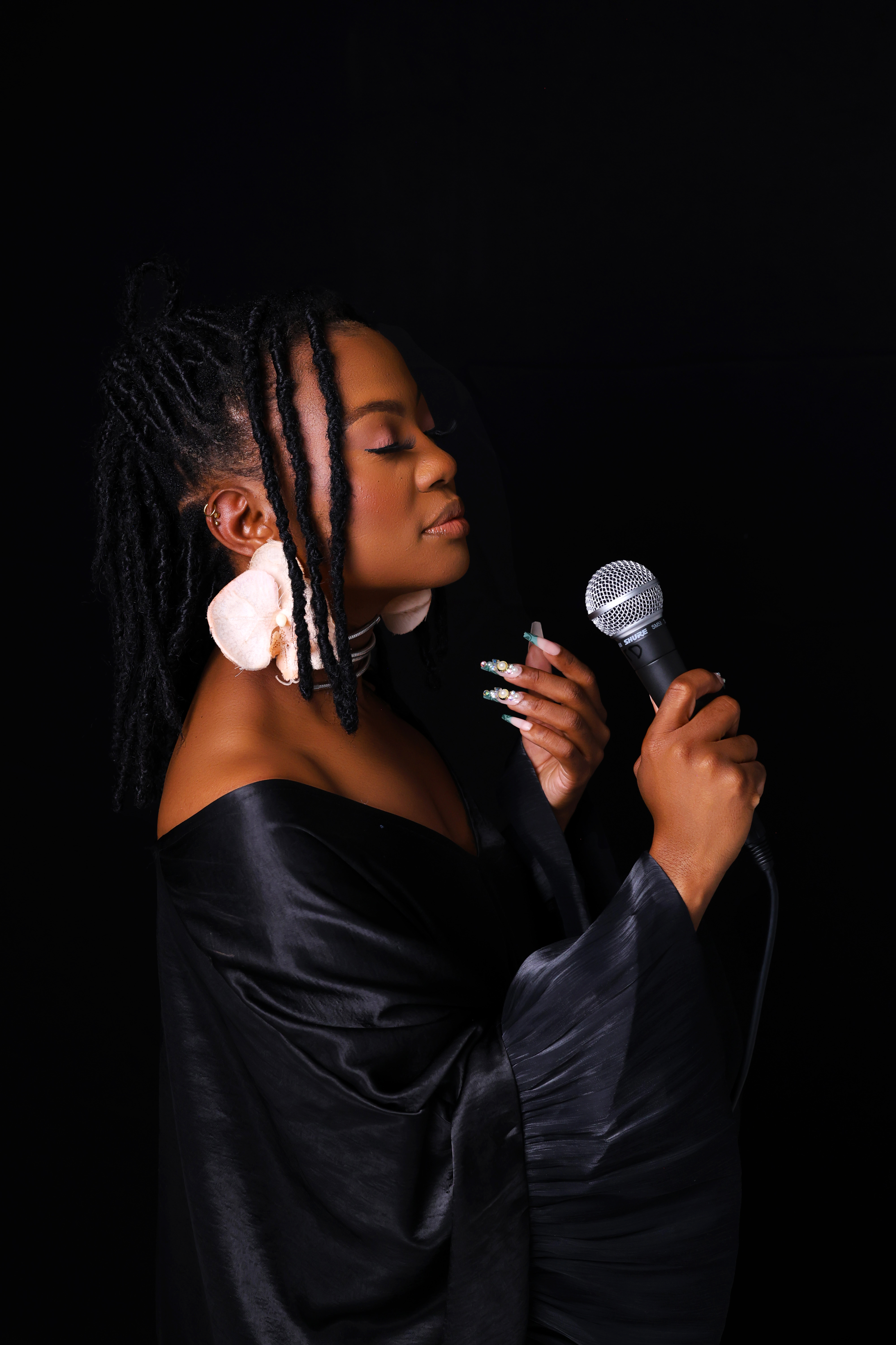Studio portrait with microphone